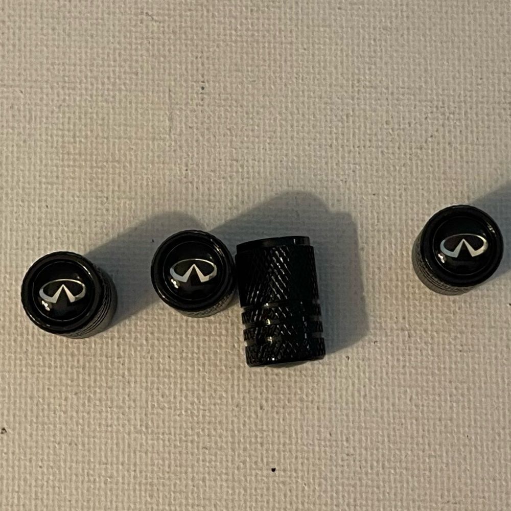 Infinity valve Stem caps in black set of 4 NWT